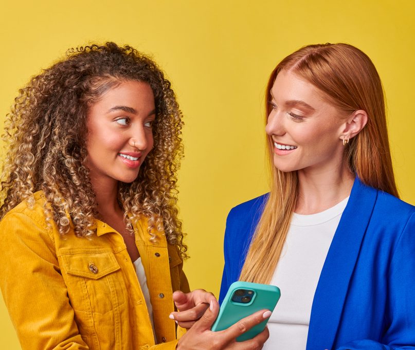This image shows two beautiful ladies talking to each other